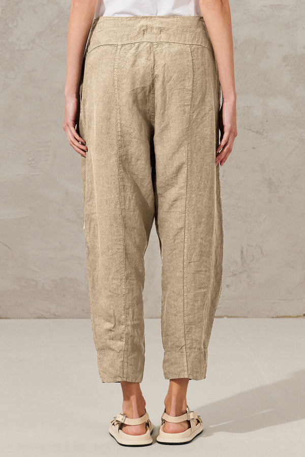 Linen wide trousers with arched line and front pleats. gathering on inside leg | 1011.CFDTRWD137.21