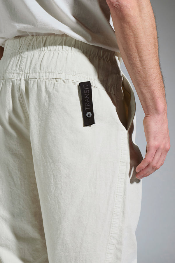 Oversize cropped trousers in linen and cotton with elastic waistband and front pleats | 1017.CFUTRCE141.U02