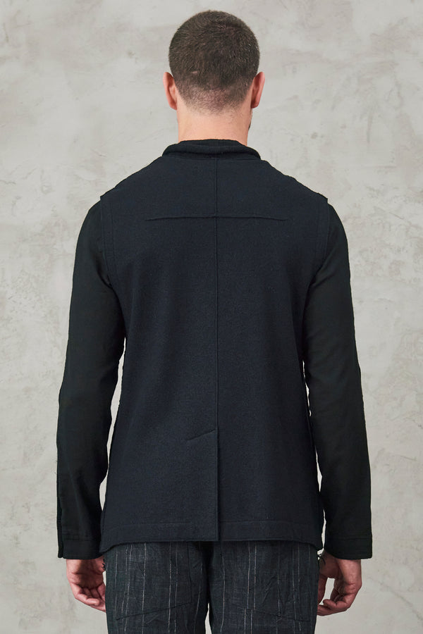 Cablé virgin wool loose-fit vest in front and in boiled wool behind | 1010.CFUTRV17523.U10