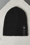 Knitted ribbed hat in cablé virgin wool | 1010.HATUTRV17526.U10